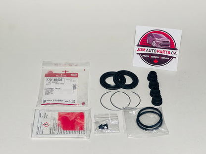 Automotive rear caliper rebuild kit for toyota alphard including seals and gaskets on a white background with JDM Auto Parts Canada logo.