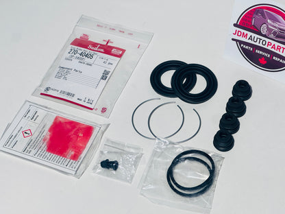 Automotive parts including seals and gaskets on a white surface with JDM Auto Parts branding. MADE FOR REAR CALIPER OF 1ST GENERATION TOYOTA ALPHARDS 