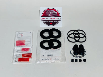 Automotive parts including gaskets and seals with JDM Auto Parts CA branding on a white background.