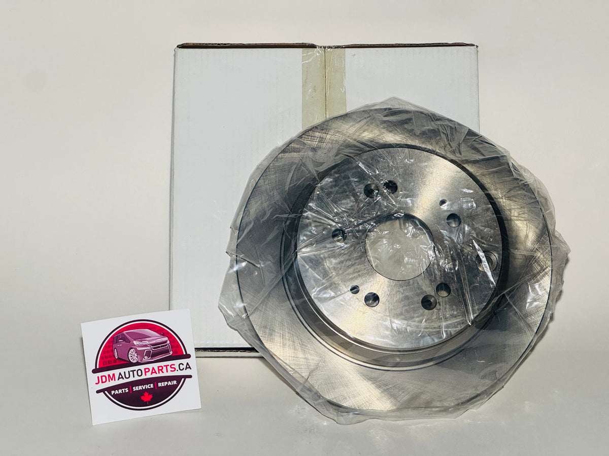 Brake disc with packaging on a white background, featuring JDM Autoparts.ca logo.