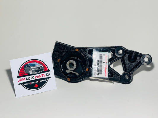 A black Toyota Estima Hybrid rear differential mount with a sticker indicating the part is for a Toyota vehicle. The part is placed against a white background.