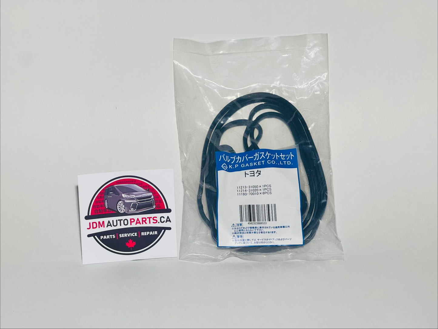 Blue belt in a clear plastic bag with a JDM Auto Parts label on a white background