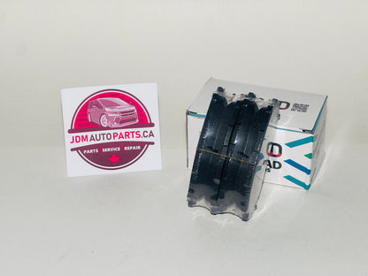 Tire and JDM Auto Parts box with a card on a white background