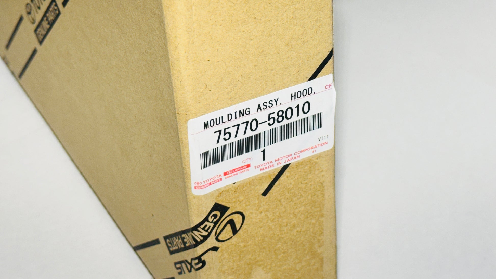 Cardboard box with a label on a white background